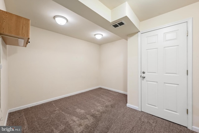 basement with carpet flooring