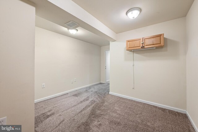 empty room featuring carpet