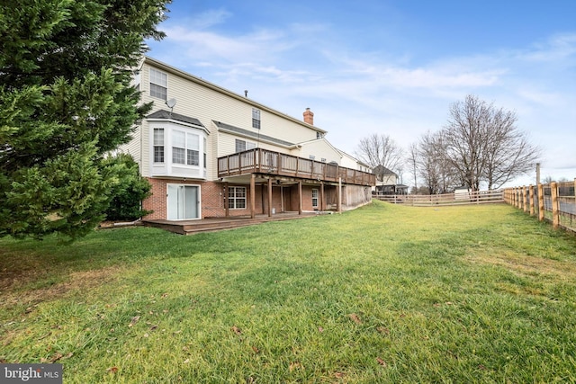 view of yard featuring a wooden deck