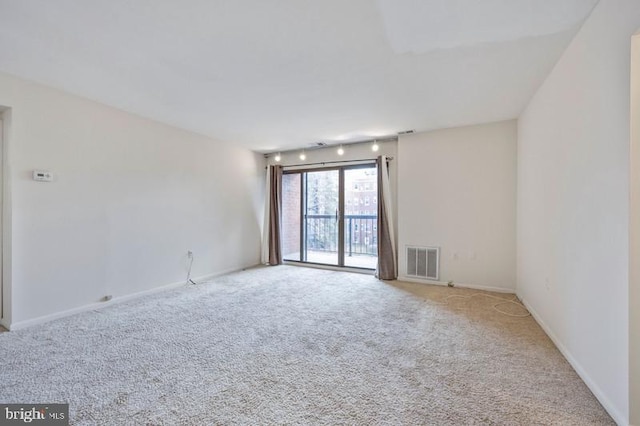 6711 Park Heights Ave Unit 207, Baltimore, MD 21215 - carpeted spare room with baseboards