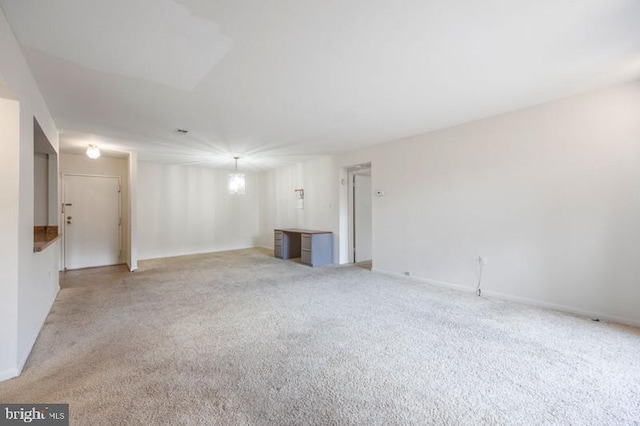 6711 Park Heights Ave Unit 207, Baltimore, MD 21215 - unfurnished living room with light carpet