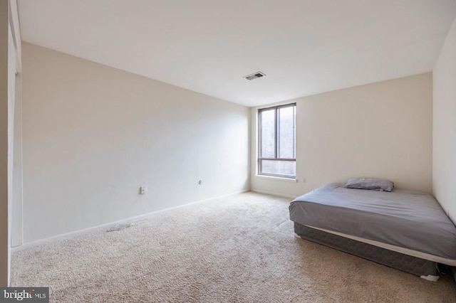 6711 Park Heights Ave Unit 207, Baltimore, MD 21215 - bedroom with carpet and baseboards