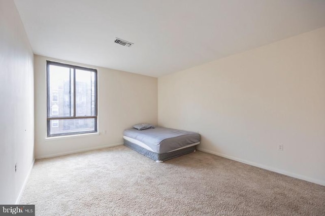 6711 Park Heights Ave Unit 207, Baltimore, MD 21215 - bedroom with carpet and baseboards