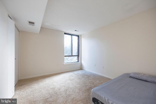 6711 Park Heights Ave Unit 207, Baltimore, MD 21215 - bedroom with carpet and baseboards