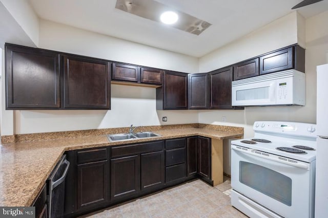 6711 Park Heights Ave Unit 207, Baltimore, MD 21215 - kitchen with white appliances, dark brown cabinets, and light tile patterned flooring