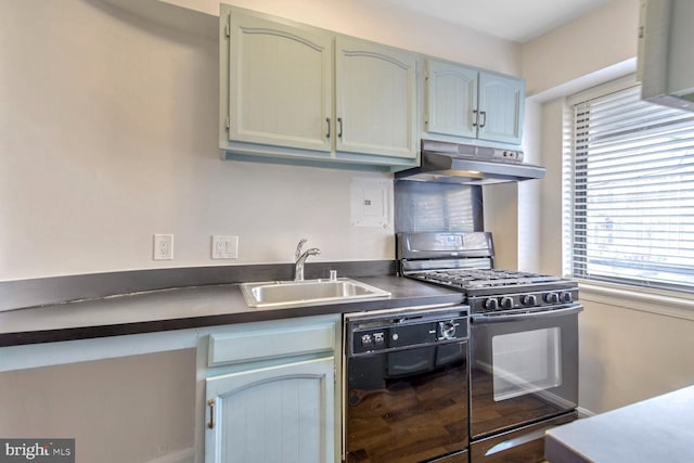 kitchen with black appliances and sink