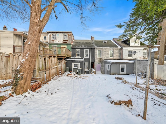 view of snow covered property