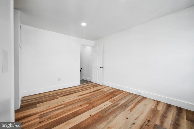 unfurnished room featuring hardwood / wood-style floors