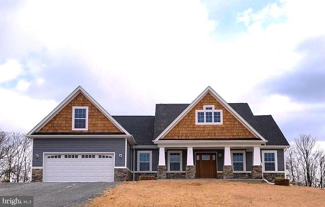 craftsman-style home with a garage