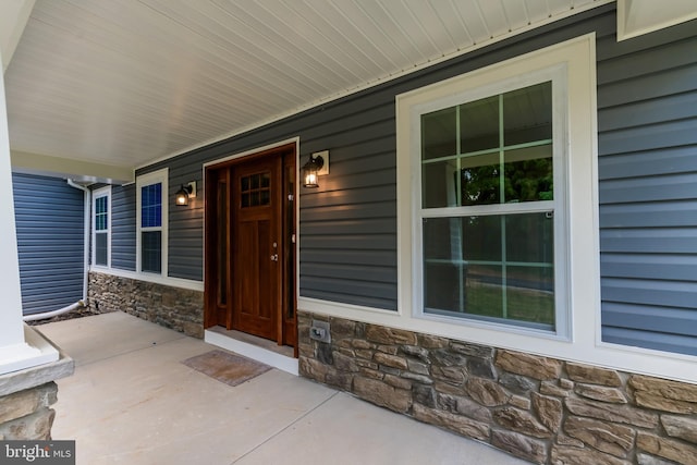 property entrance with a porch