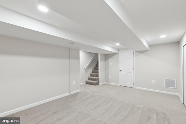 basement with light carpet