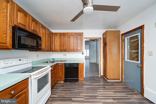 kitchen featuring brown cabinetry, ceiling fan, dark wood-style flooring, light countertops, and black appliances