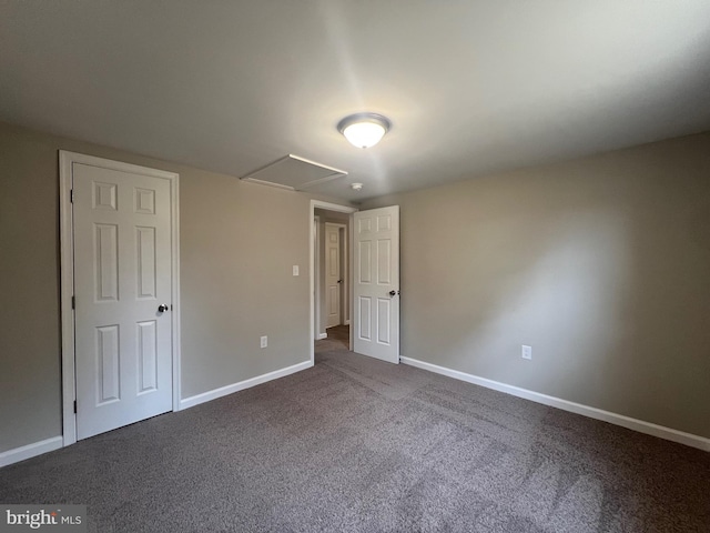 unfurnished bedroom with carpet flooring