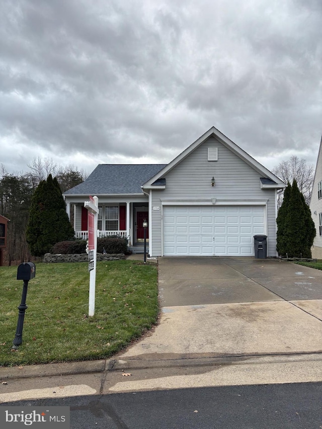 single story home featuring a garage, a front lawn, concrete driveway, and roof with shingles