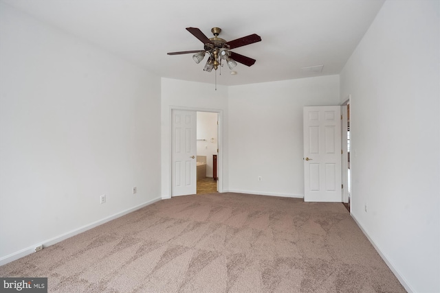 interior space with ceiling fan and light carpet