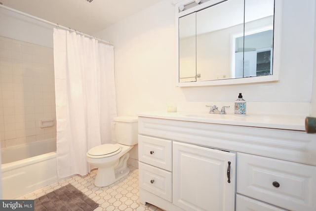 full bathroom with vanity, toilet, and shower / bath combo