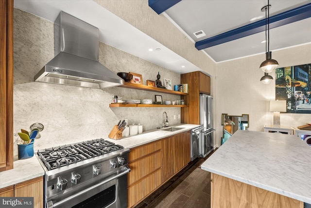 kitchen featuring sink, wall chimney exhaust hood, hanging light fixtures, dark hardwood / wood-style floors, and high end appliances