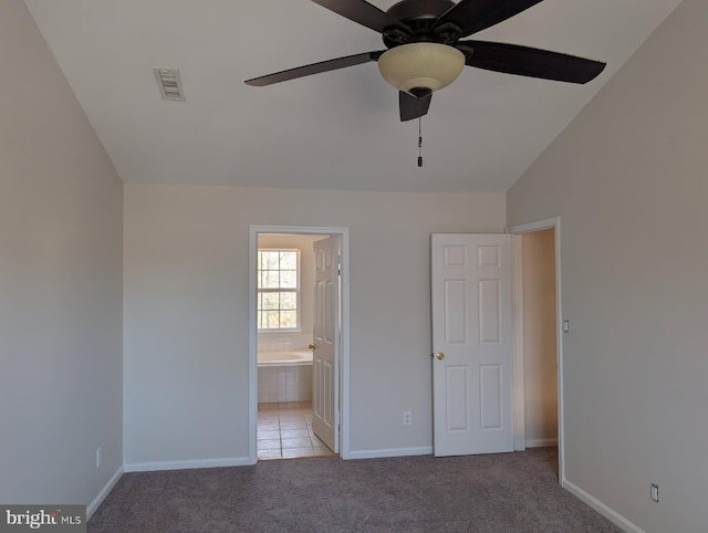 unfurnished bedroom featuring light carpet, visible vents, and baseboards