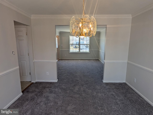 interior space with a chandelier, dark colored carpet, crown molding, and baseboards