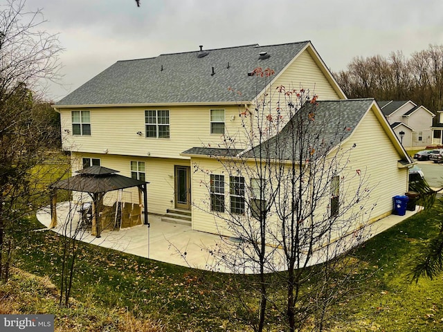 rear view of property with a patio