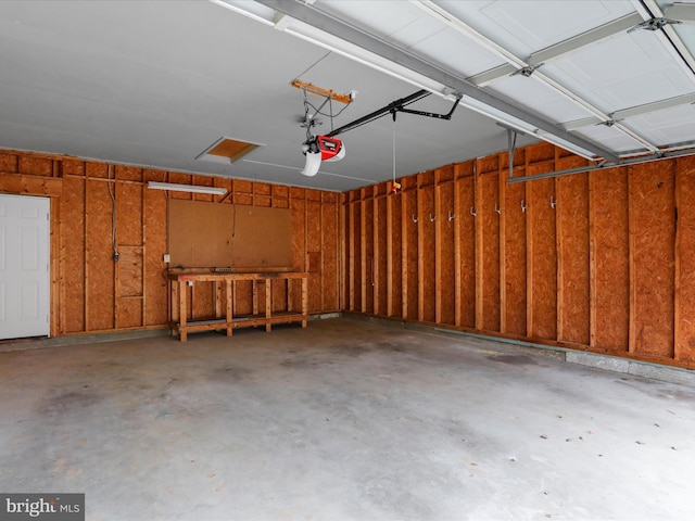 garage featuring a garage door opener