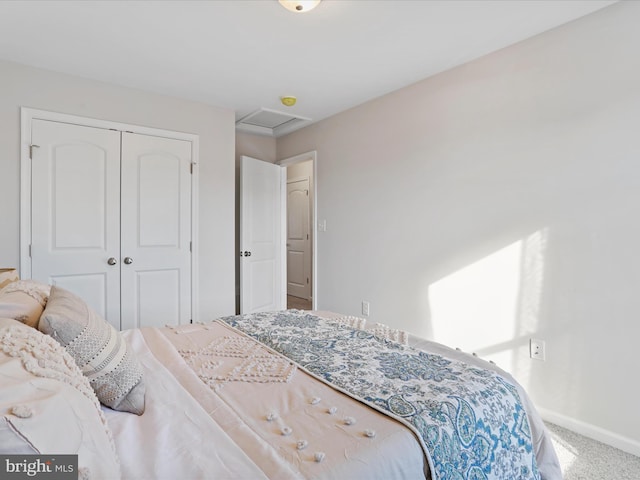 bedroom with a closet and carpet flooring