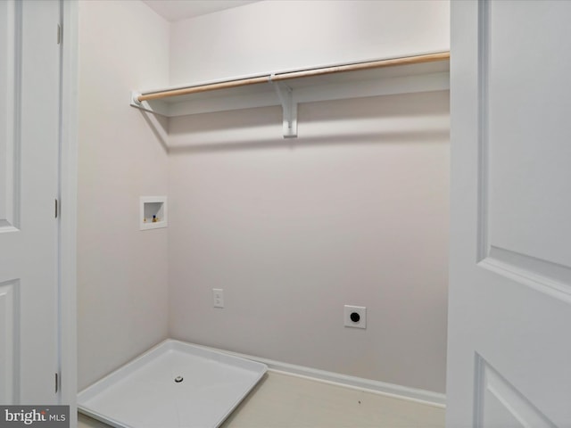 laundry area with hookup for a washing machine and hookup for an electric dryer