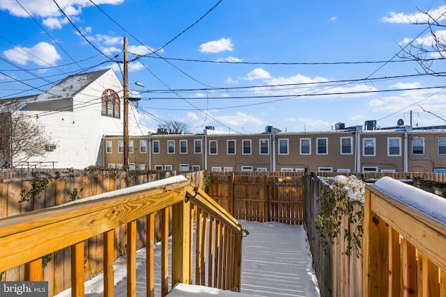 view of snow covered deck