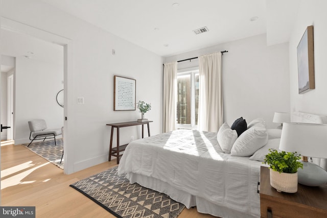 bedroom featuring light hardwood / wood-style flooring