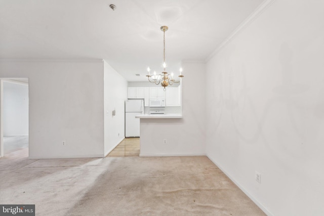 unfurnished dining area featuring light carpet, a chandelier, and ornamental molding