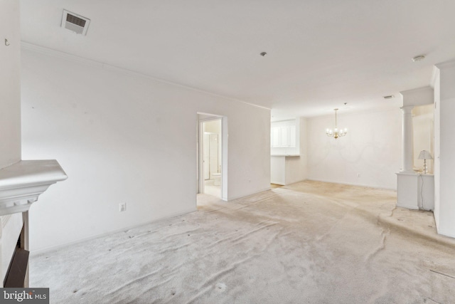 unfurnished living room featuring a notable chandelier and light colored carpet