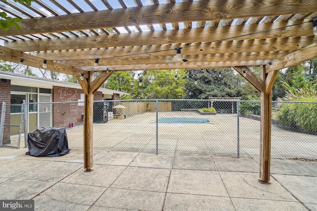 view of patio featuring a pergola