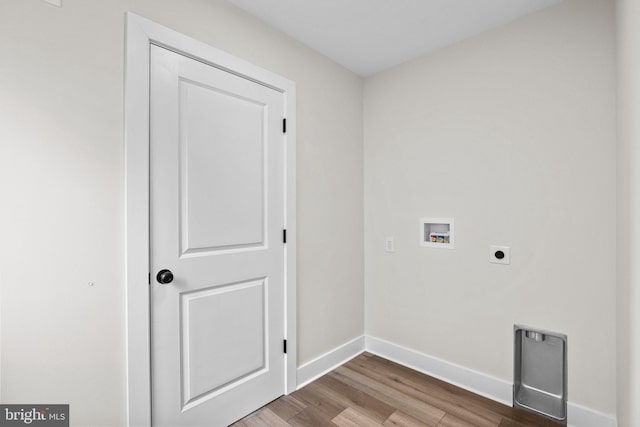 laundry room featuring hardwood / wood-style floors, washer hookup, and hookup for an electric dryer