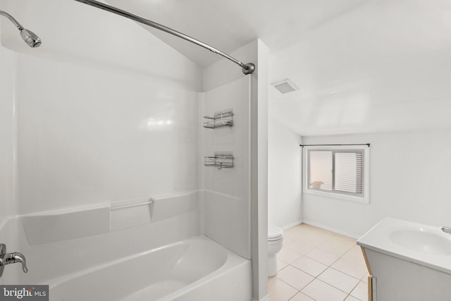 full bathroom featuring tile patterned floors, vanity, toilet, and shower / washtub combination