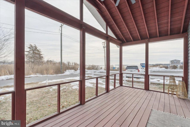 unfurnished sunroom with wood ceiling and lofted ceiling