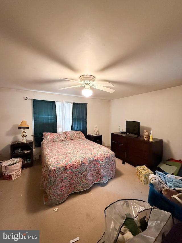 carpeted bedroom with ceiling fan