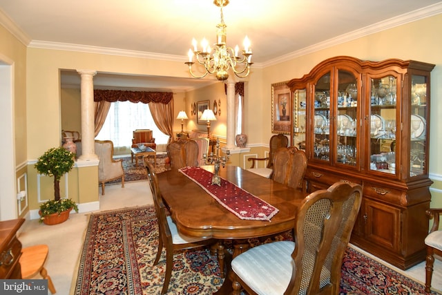 carpeted dining space featuring ornate columns, crown molding, and a notable chandelier