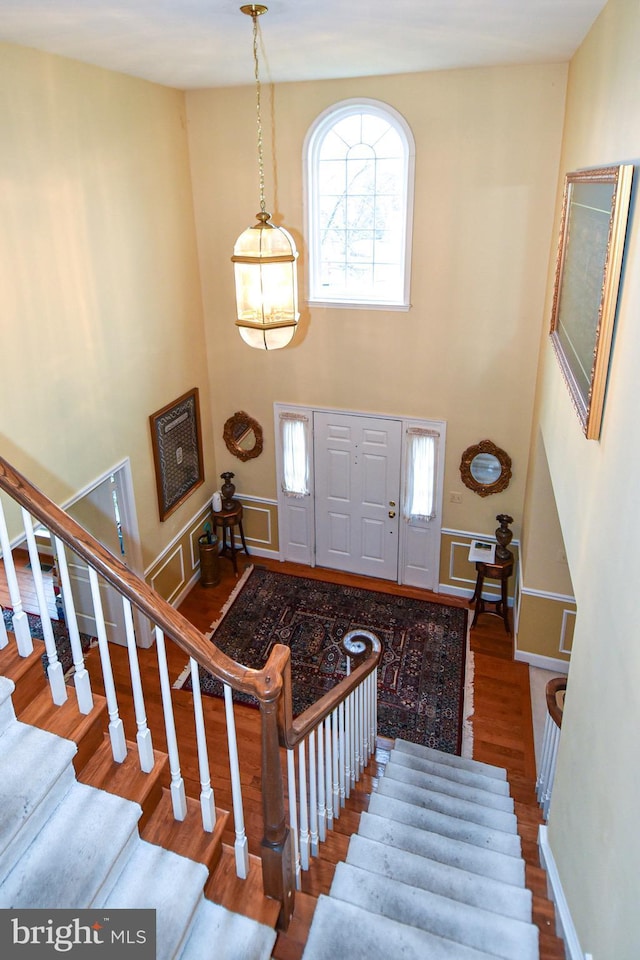 entryway with wood-type flooring