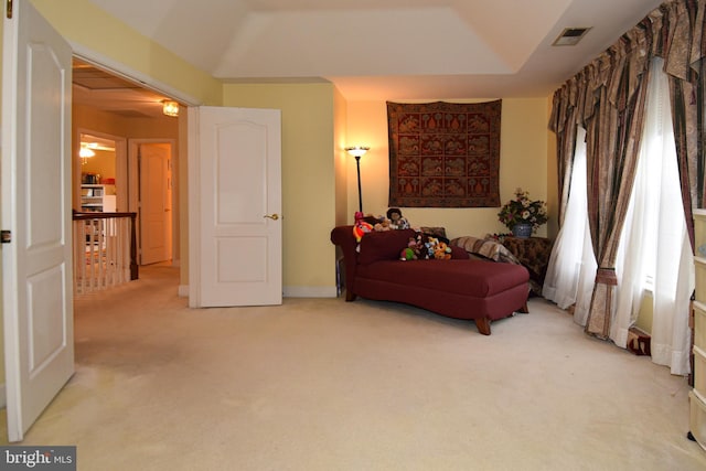 living area featuring ceiling fan and carpet floors