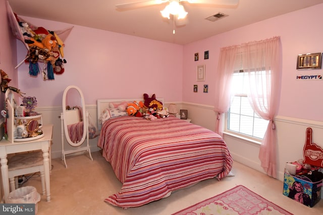 carpeted bedroom featuring ceiling fan