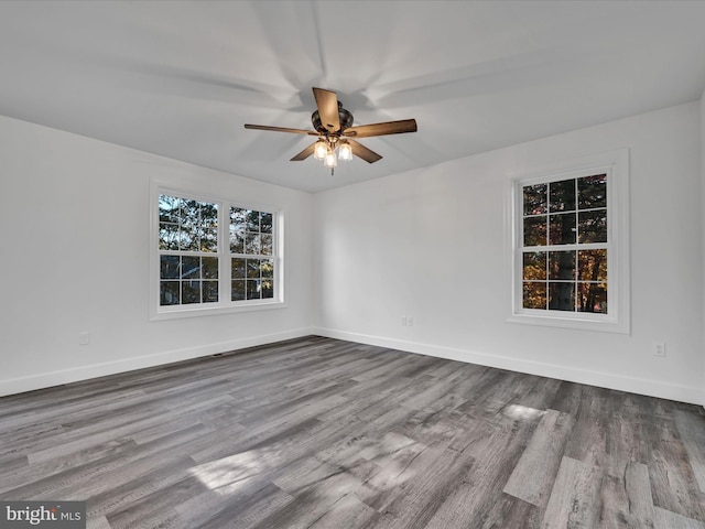 unfurnished room featuring light wood-type flooring and ceiling fan