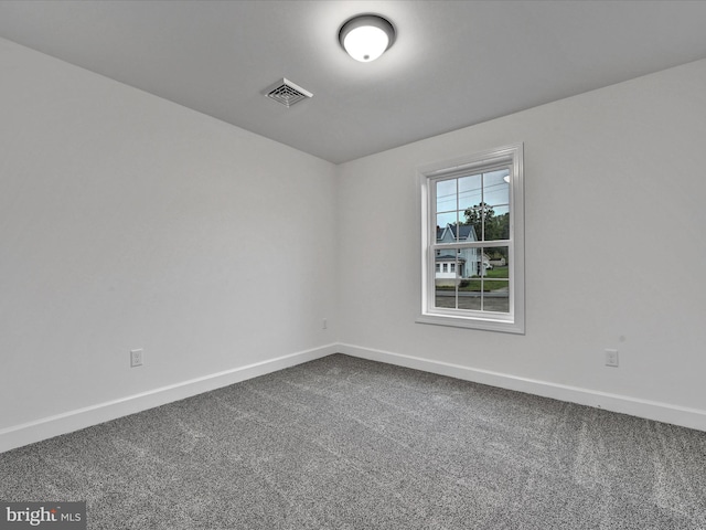 unfurnished room featuring carpet floors