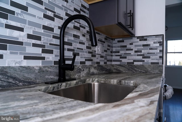 room details with sink and tasteful backsplash