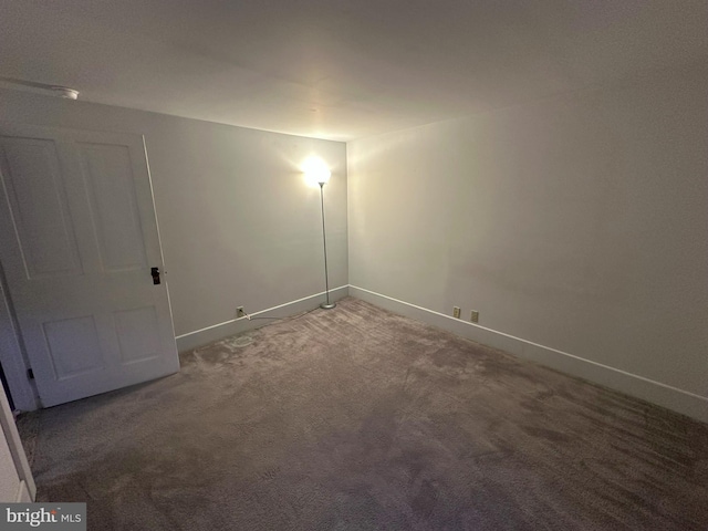 spare room featuring carpet flooring