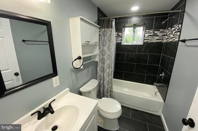 full bathroom featuring vanity, tile patterned flooring, shower / bathtub combination with curtain, and toilet