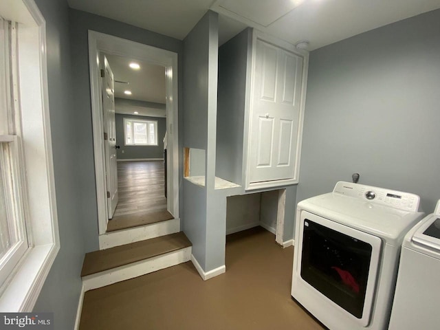 laundry area with washer and clothes dryer