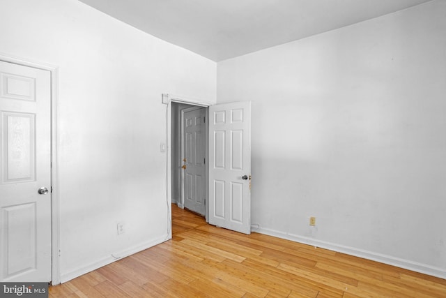 unfurnished room featuring light hardwood / wood-style floors