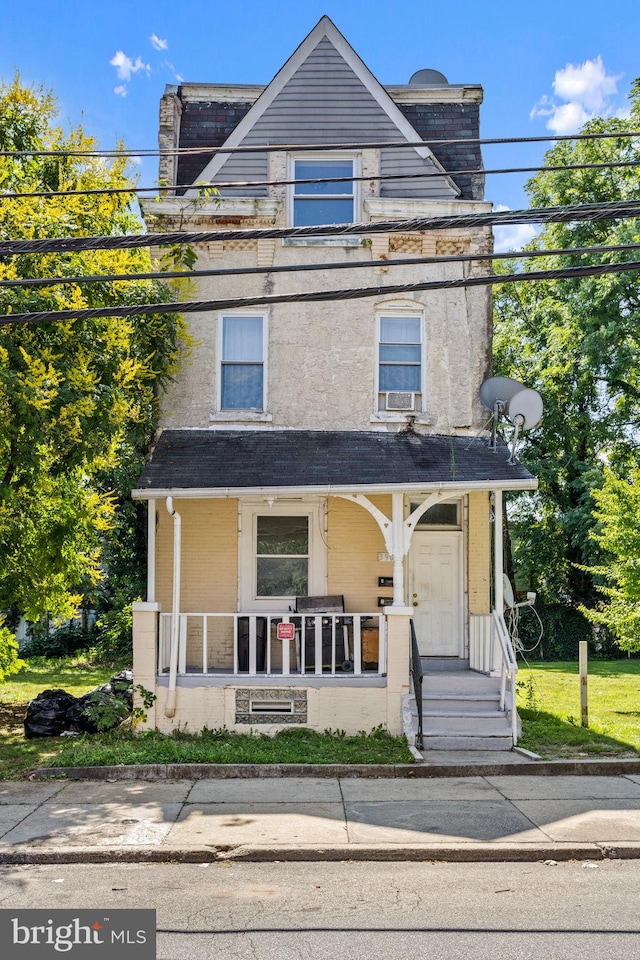 view of front of home with cooling unit