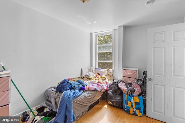 bedroom featuring hardwood / wood-style floors