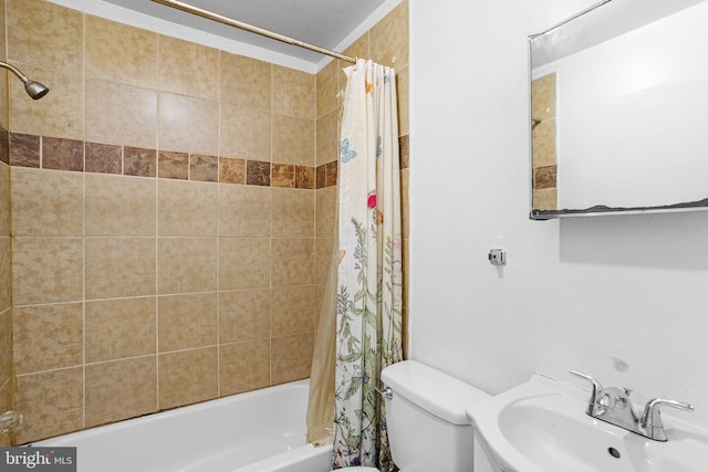 full bathroom with toilet, sink, and shower / tub combo with curtain